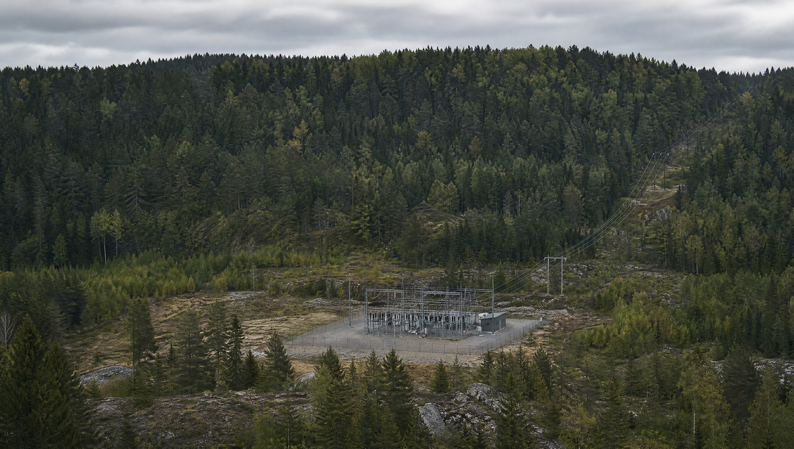 A remote electrical substation surrounded by Swedish forest
